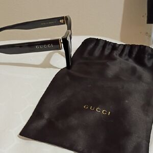 Gucci Black Sunglasses with Gold Detailing